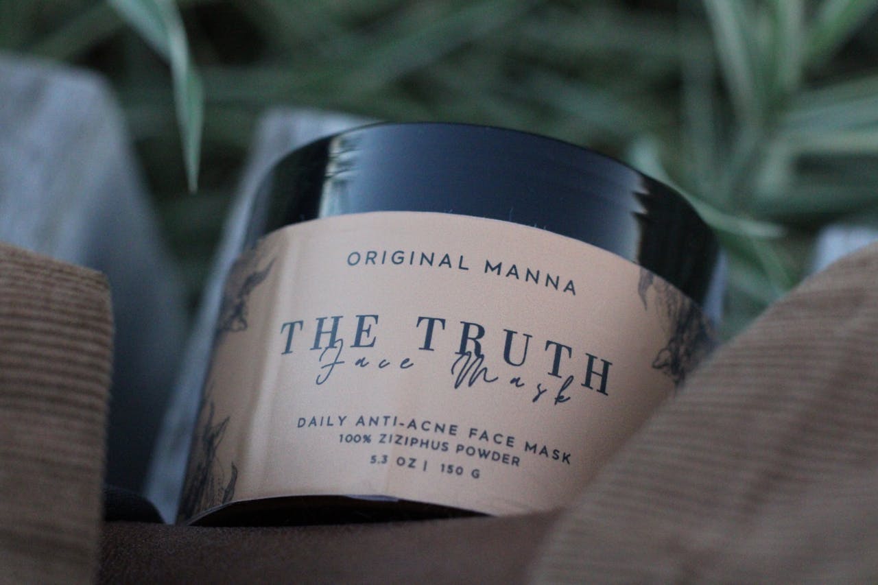 Detailed close-up of a skincare face mask jar, perfect for beauty product listings.